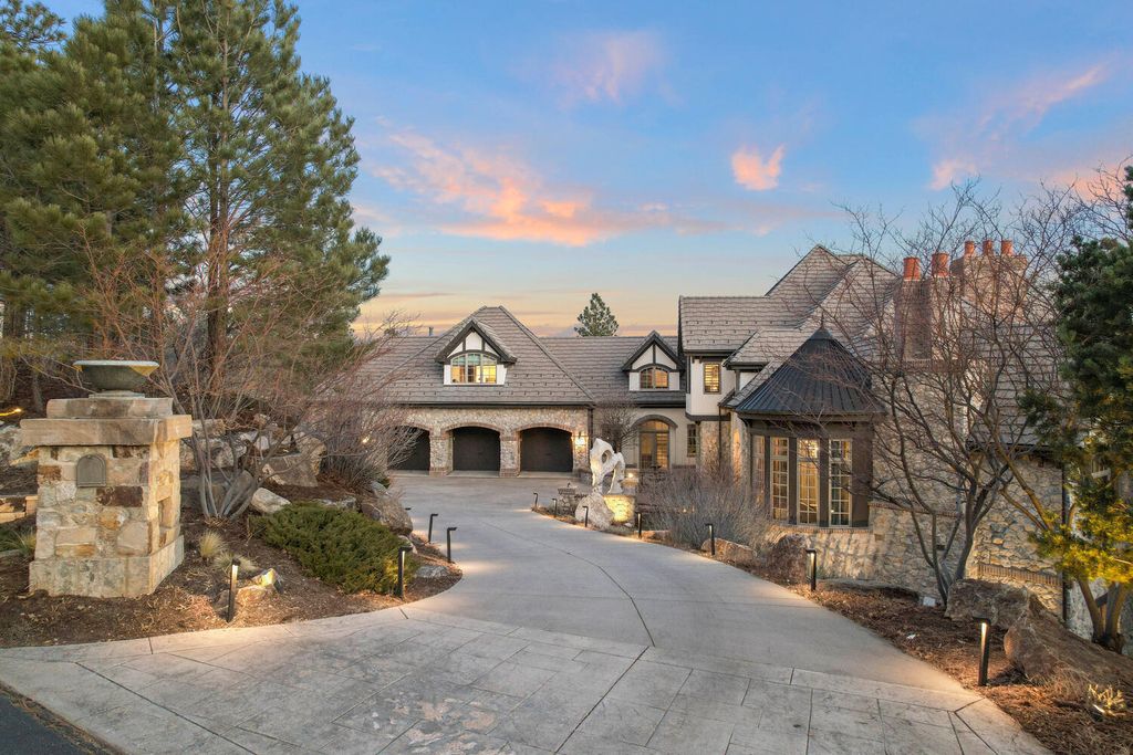 4 Eagle Pointe Lane, Castle Rock, Colorado is a a stunning renovation of a 2003 Trillium Home with the sweeping layout, along with dramatic wall and ceiling treatments, immaculate wood features, multiple fireplaces, and high-end designer finishes.