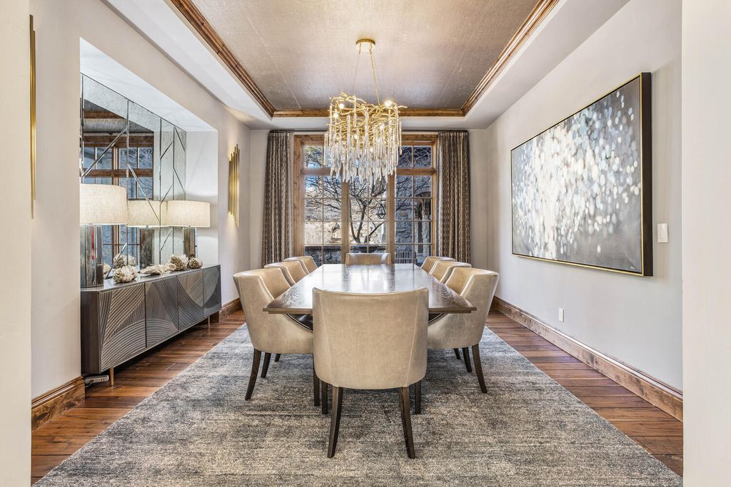 4 Eagle Pointe Lane, Castle Rock, Colorado is a a stunning renovation of a 2003 Trillium Home with the sweeping layout, along with dramatic wall and ceiling treatments, immaculate wood features, multiple fireplaces, and high-end designer finishes.