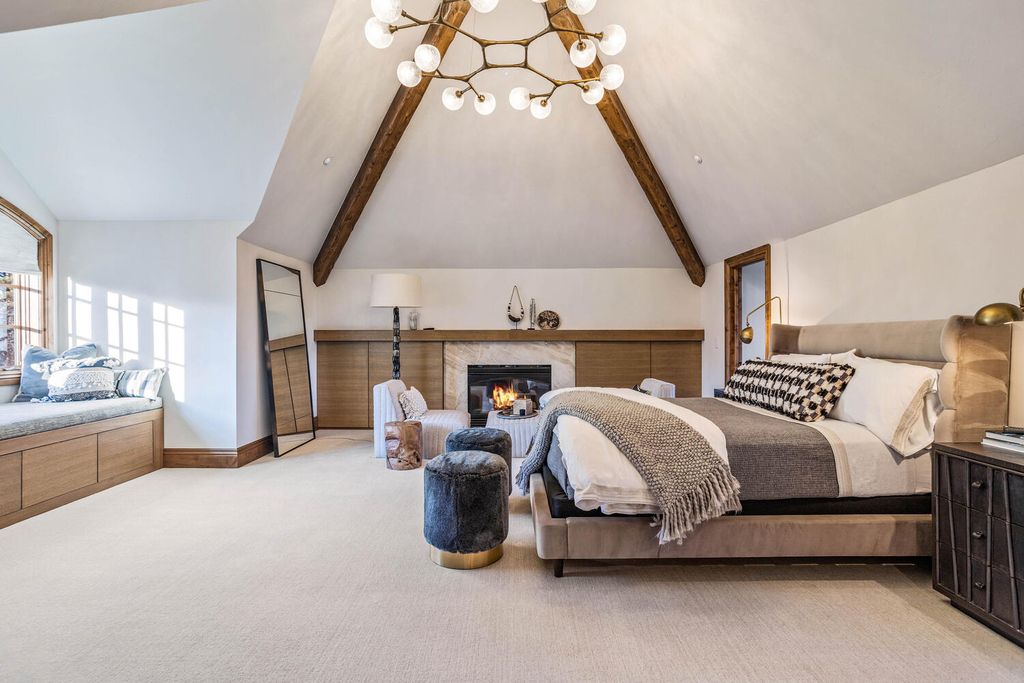 4 Eagle Pointe Lane, Castle Rock, Colorado is a a stunning renovation of a 2003 Trillium Home with the sweeping layout, along with dramatic wall and ceiling treatments, immaculate wood features, multiple fireplaces, and high-end designer finishes.