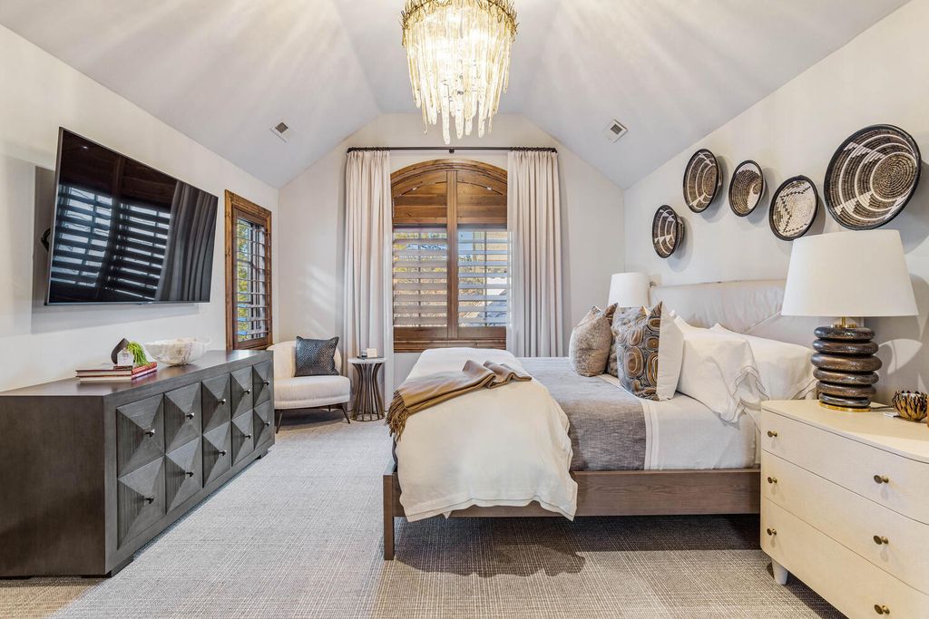 4 Eagle Pointe Lane, Castle Rock, Colorado is a a stunning renovation of a 2003 Trillium Home with the sweeping layout, along with dramatic wall and ceiling treatments, immaculate wood features, multiple fireplaces, and high-end designer finishes.