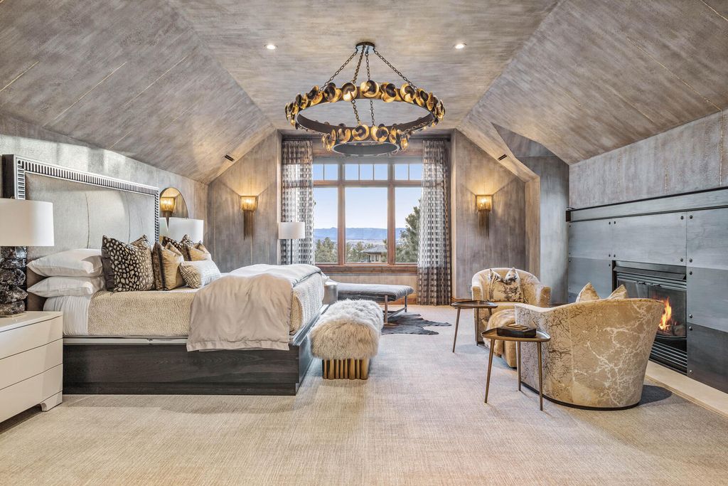 4 Eagle Pointe Lane, Castle Rock, Colorado is a a stunning renovation of a 2003 Trillium Home with the sweeping layout, along with dramatic wall and ceiling treatments, immaculate wood features, multiple fireplaces, and high-end designer finishes.