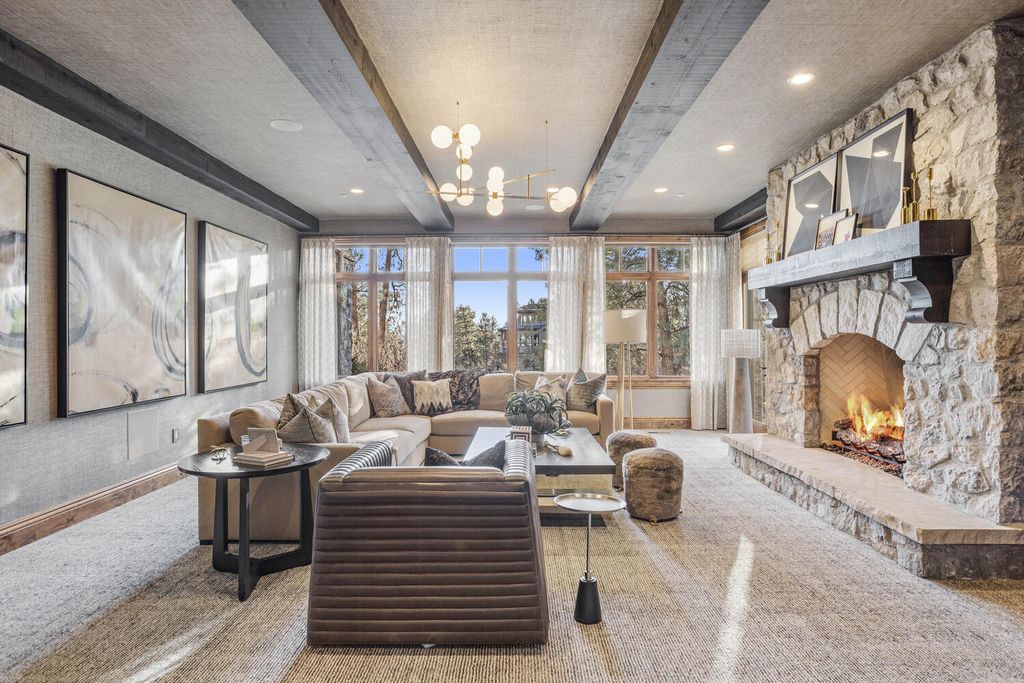 4 Eagle Pointe Lane, Castle Rock, Colorado is a a stunning renovation of a 2003 Trillium Home with the sweeping layout, along with dramatic wall and ceiling treatments, immaculate wood features, multiple fireplaces, and high-end designer finishes.