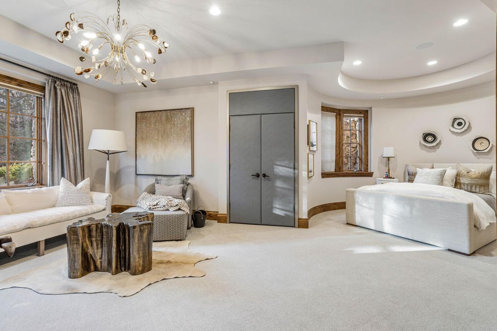 4 Eagle Pointe Lane, Castle Rock, Colorado is a a stunning renovation of a 2003 Trillium Home with the sweeping layout, along with dramatic wall and ceiling treatments, immaculate wood features, multiple fireplaces, and high-end designer finishes.