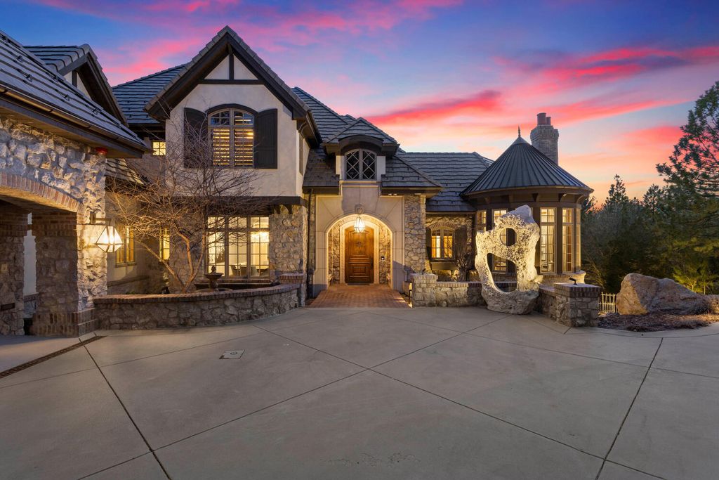 4 Eagle Pointe Lane, Castle Rock, Colorado is a a stunning renovation of a 2003 Trillium Home with the sweeping layout, along with dramatic wall and ceiling treatments, immaculate wood features, multiple fireplaces, and high-end designer finishes.