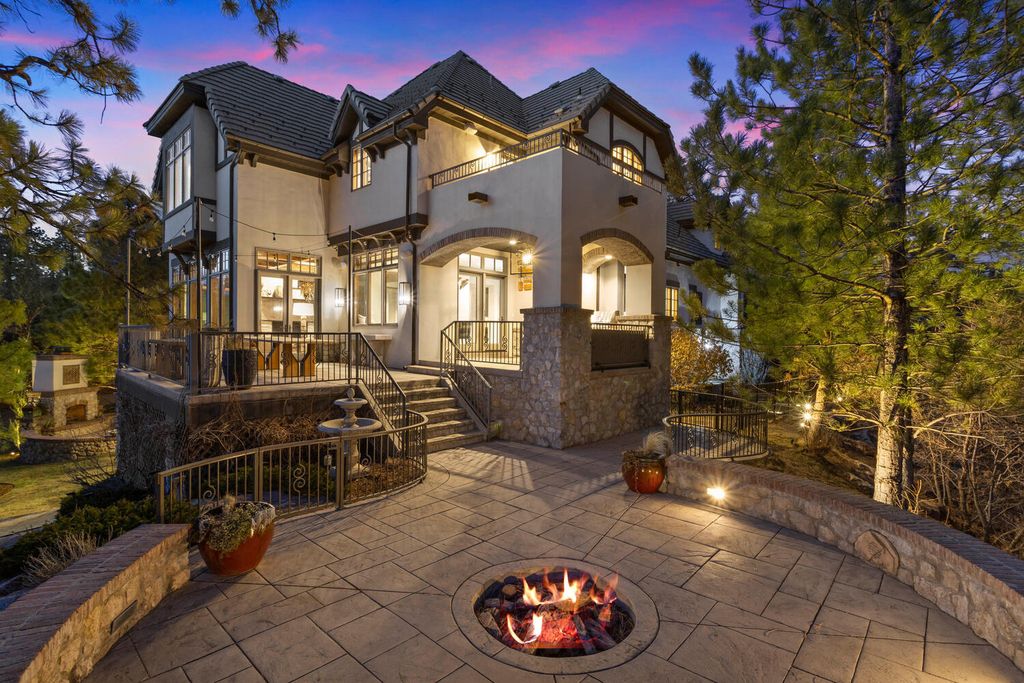 4 Eagle Pointe Lane, Castle Rock, Colorado is a a stunning renovation of a 2003 Trillium Home with the sweeping layout, along with dramatic wall and ceiling treatments, immaculate wood features, multiple fireplaces, and high-end designer finishes.