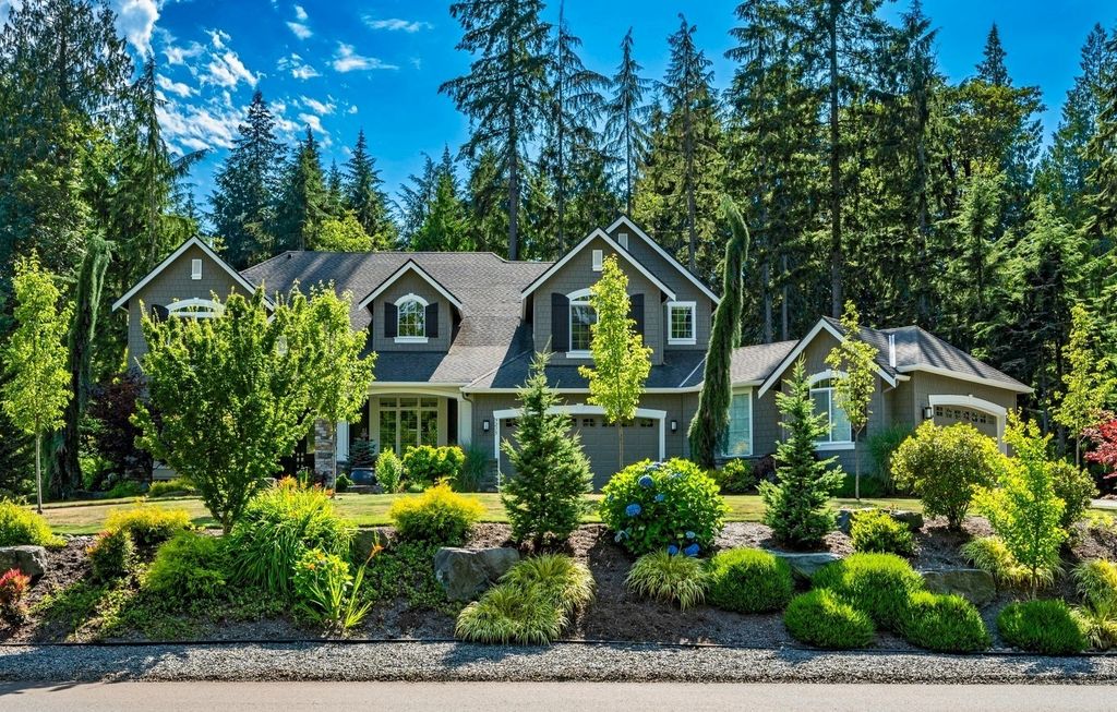 The Home in Redmond is a luxurious home with gracious room sizes and cozy spaces, now available for sale. This home located at 9215 255th Avenue NE, Redmond, Washington