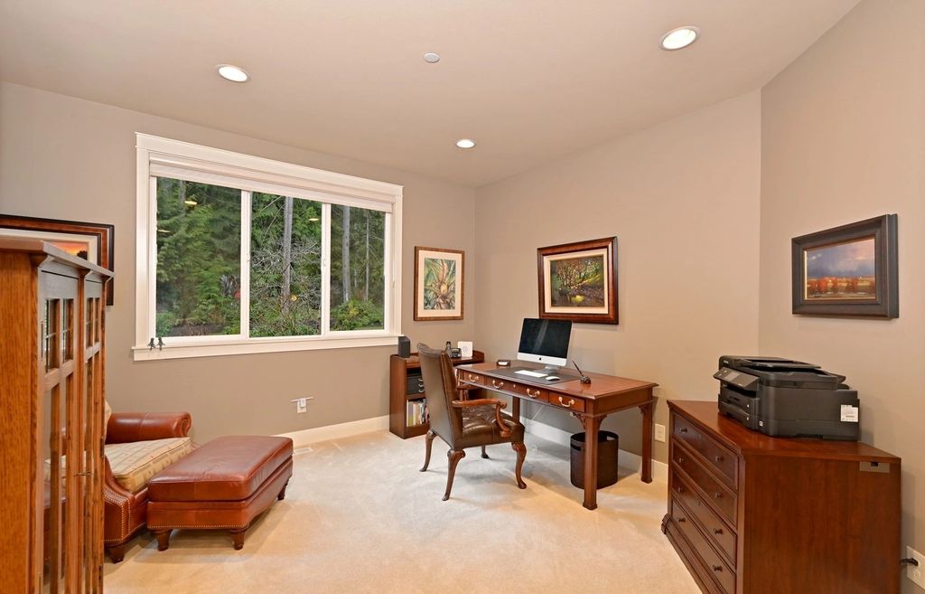 The Home in Redmond is a luxurious home with gracious room sizes and cozy spaces, now available for sale. This home located at 9215 255th Avenue NE, Redmond, Washington