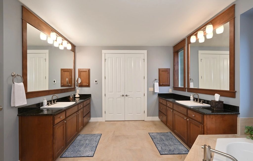 The Home in Redmond is a luxurious home with gracious room sizes and cozy spaces, now available for sale. This home located at 9215 255th Avenue NE, Redmond, Washington