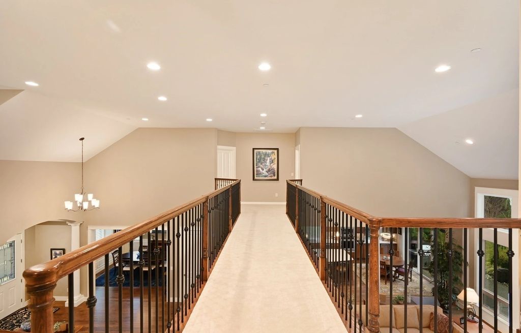 The Home in Redmond is a luxurious home with gracious room sizes and cozy spaces, now available for sale. This home located at 9215 255th Avenue NE, Redmond, Washington