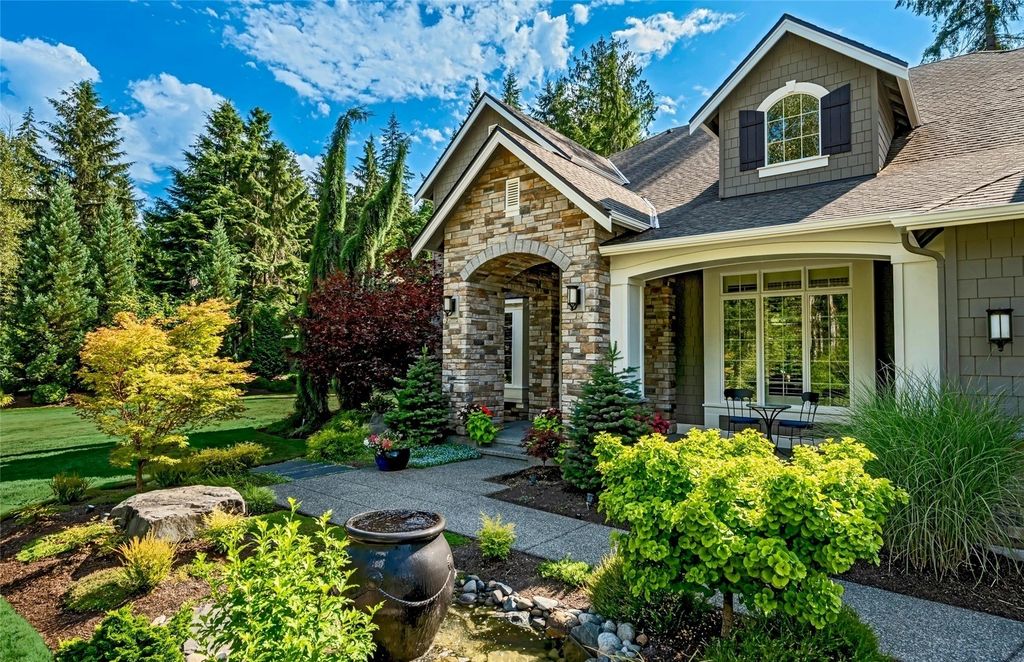 The Home in Redmond is a luxurious home with gracious room sizes and cozy spaces, now available for sale. This home located at 9215 255th Avenue NE, Redmond, Washington