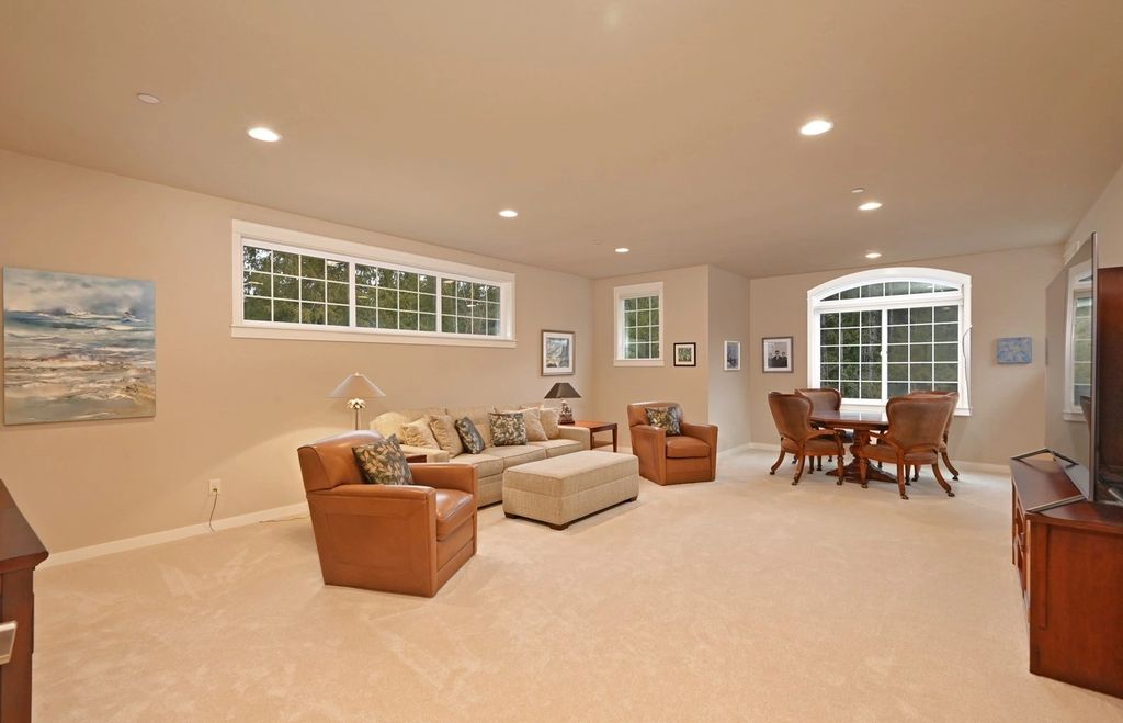 The Home in Redmond is a luxurious home with gracious room sizes and cozy spaces, now available for sale. This home located at 9215 255th Avenue NE, Redmond, Washington