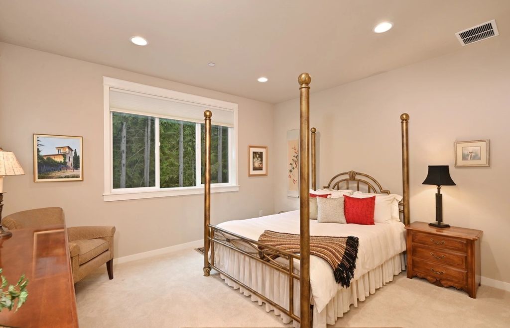 The Home in Redmond is a luxurious home with gracious room sizes and cozy spaces, now available for sale. This home located at 9215 255th Avenue NE, Redmond, Washington