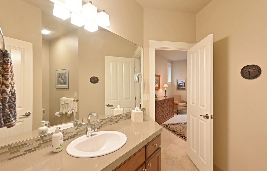 The Home in Redmond is a luxurious home with gracious room sizes and cozy spaces, now available for sale. This home located at 9215 255th Avenue NE, Redmond, Washington