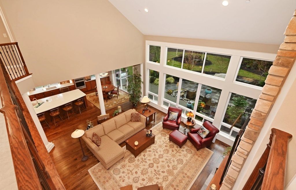 The Home in Redmond is a luxurious home with gracious room sizes and cozy spaces, now available for sale. This home located at 9215 255th Avenue NE, Redmond, Washington