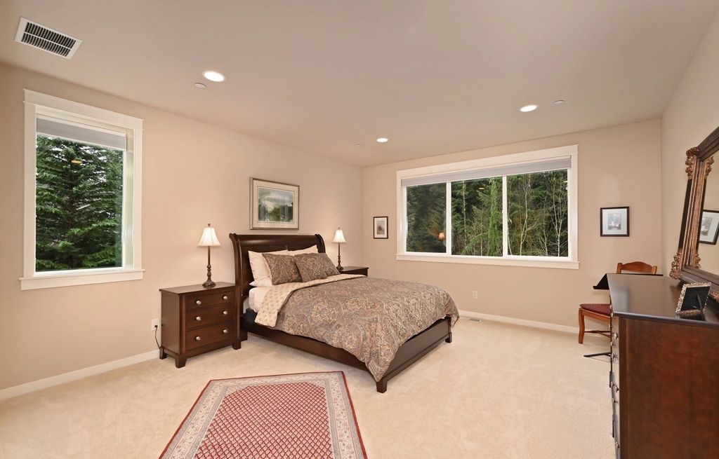 The Home in Redmond is a luxurious home with gracious room sizes and cozy spaces, now available for sale. This home located at 9215 255th Avenue NE, Redmond, Washington