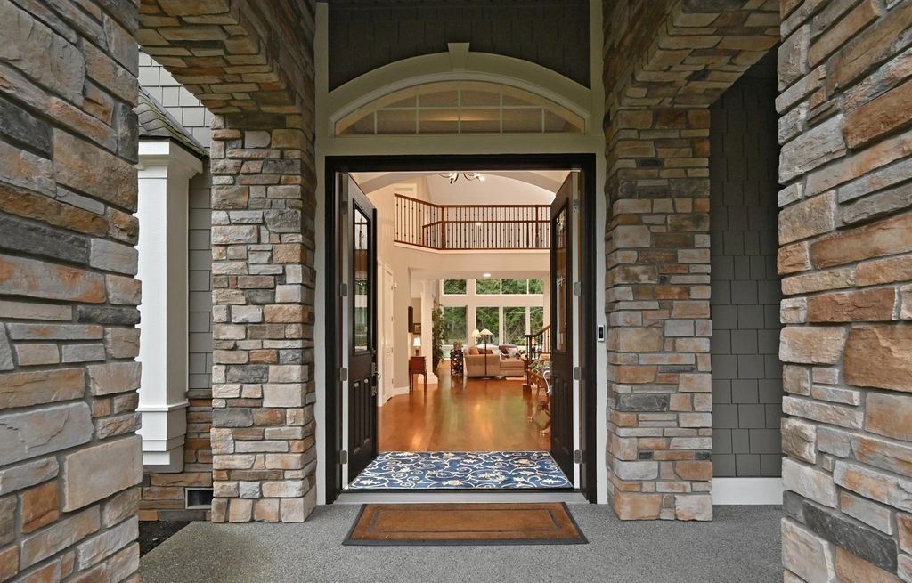The Home in Redmond is a luxurious home with gracious room sizes and cozy spaces, now available for sale. This home located at 9215 255th Avenue NE, Redmond, Washington