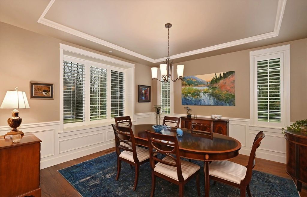 The Home in Redmond is a luxurious home with gracious room sizes and cozy spaces, now available for sale. This home located at 9215 255th Avenue NE, Redmond, Washington