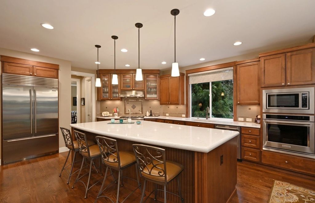 The Home in Redmond is a luxurious home with gracious room sizes and cozy spaces, now available for sale. This home located at 9215 255th Avenue NE, Redmond, Washington