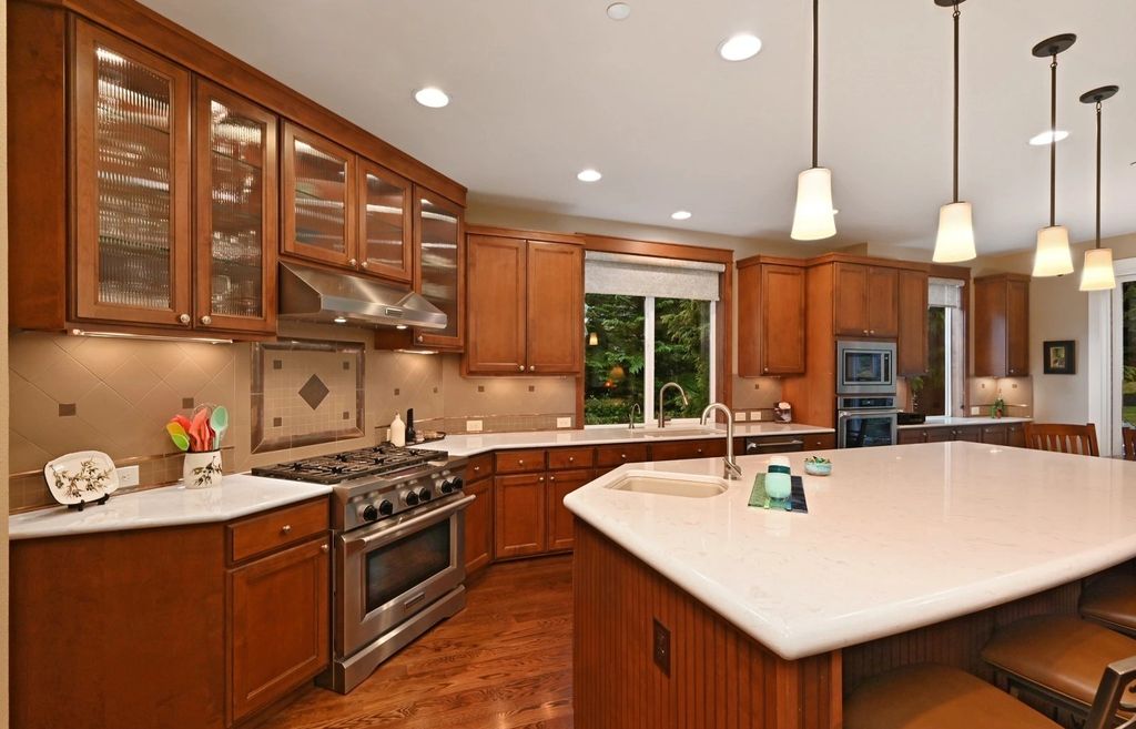 The Home in Redmond is a luxurious home with gracious room sizes and cozy spaces, now available for sale. This home located at 9215 255th Avenue NE, Redmond, Washington