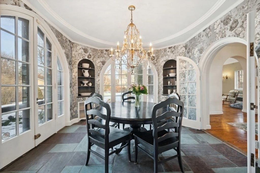 The House in Kenilworth is a distinguished home with a stately circular drive boasts an extra large lot...over a half acre, now available for sale. This home located at 355 Kenilworth Ave, Kenilworth, Illinois