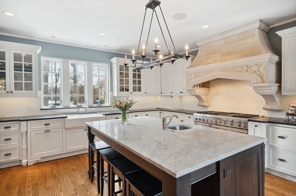The House in Kenilworth is a distinguished home with a stately circular drive boasts an extra large lot...over a half acre, now available for sale. This home located at 355 Kenilworth Ave, Kenilworth, Illinois