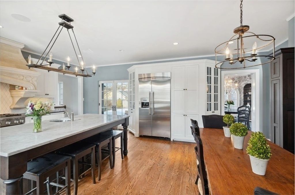 The House in Kenilworth is a distinguished home with a stately circular drive boasts an extra large lot...over a half acre, now available for sale. This home located at 355 Kenilworth Ave, Kenilworth, Illinois