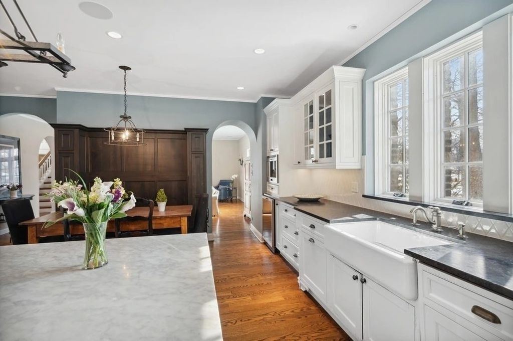 The House in Kenilworth is a distinguished home with a stately circular drive boasts an extra large lot...over a half acre, now available for sale. This home located at 355 Kenilworth Ave, Kenilworth, Illinois