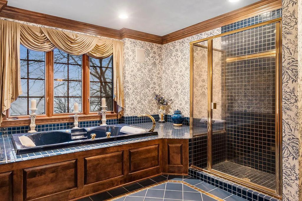 The Estate in Oconomowoc is a luxurious home with luxurious details throughout and unparalleled lakefront views now available for sale. This home located at 34595 Springbank Rd, Oconomowoc, Wisconsin; offering 04 bedrooms and 04 bathrooms with 5,694 square feet of living spaces.