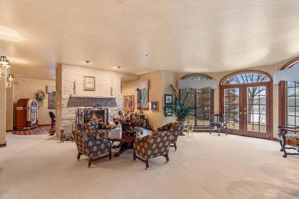The Estate in Oconomowoc is a luxurious home with luxurious details throughout and unparalleled lakefront views now available for sale. This home located at 34595 Springbank Rd, Oconomowoc, Wisconsin; offering 04 bedrooms and 04 bathrooms with 5,694 square feet of living spaces.