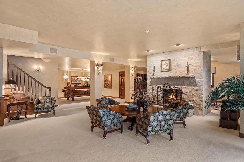 The Estate in Oconomowoc is a luxurious home with luxurious details throughout and unparalleled lakefront views now available for sale. This home located at 34595 Springbank Rd, Oconomowoc, Wisconsin; offering 04 bedrooms and 04 bathrooms with 5,694 square feet of living spaces.