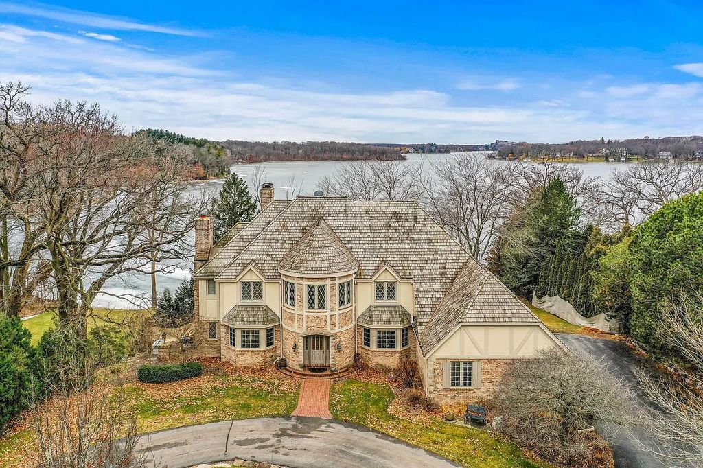 The Estate in Oconomowoc is a luxurious home with luxurious details throughout and unparalleled lakefront views now available for sale. This home located at 34595 Springbank Rd, Oconomowoc, Wisconsin; offering 04 bedrooms and 04 bathrooms with 5,694 square feet of living spaces.