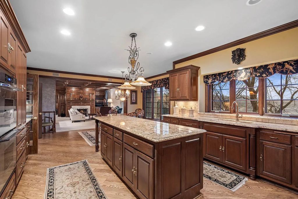 The Estate in Oconomowoc is a luxurious home with luxurious details throughout and unparalleled lakefront views now available for sale. This home located at 34595 Springbank Rd, Oconomowoc, Wisconsin; offering 04 bedrooms and 04 bathrooms with 5,694 square feet of living spaces.