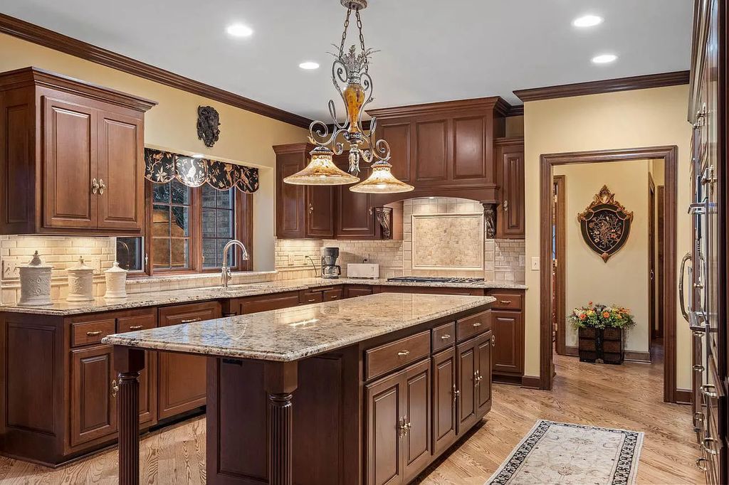 The Estate in Oconomowoc is a luxurious home with luxurious details throughout and unparalleled lakefront views now available for sale. This home located at 34595 Springbank Rd, Oconomowoc, Wisconsin; offering 04 bedrooms and 04 bathrooms with 5,694 square feet of living spaces.