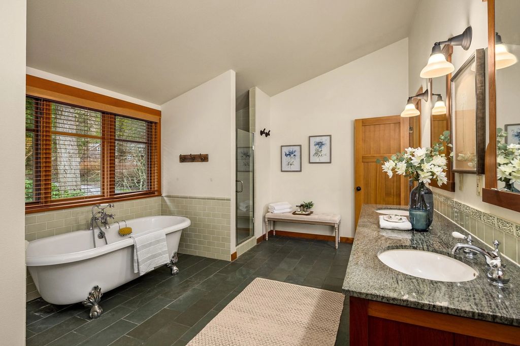 The Home in Bainbridge Island is an exceptional custom estate with 2 homes on a combined acre including 139’ of spectacular water frontage, now available for sale. This home located at 17253 & 17204 Agate Street NE, Bainbridge Island, Washington