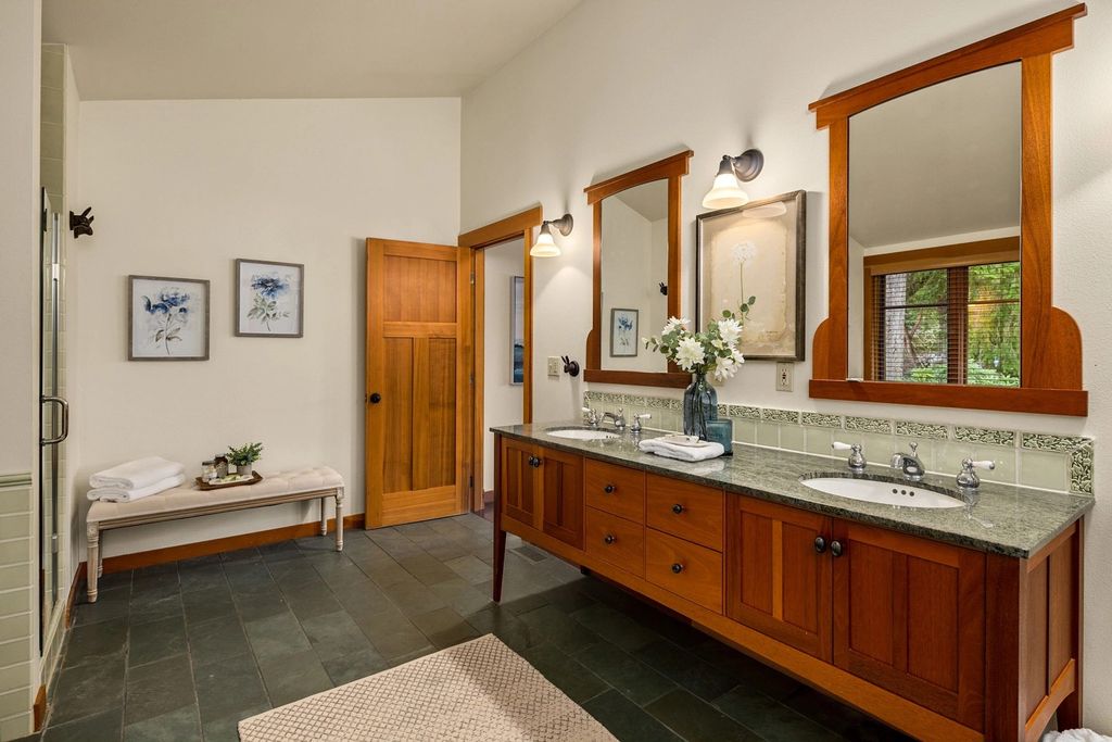 The Home in Bainbridge Island is an exceptional custom estate with 2 homes on a combined acre including 139’ of spectacular water frontage, now available for sale. This home located at 17253 & 17204 Agate Street NE, Bainbridge Island, Washington