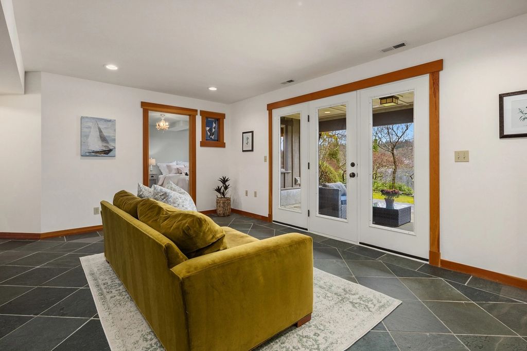 The Home in Bainbridge Island is an exceptional custom estate with 2 homes on a combined acre including 139’ of spectacular water frontage, now available for sale. This home located at 17253 & 17204 Agate Street NE, Bainbridge Island, Washington