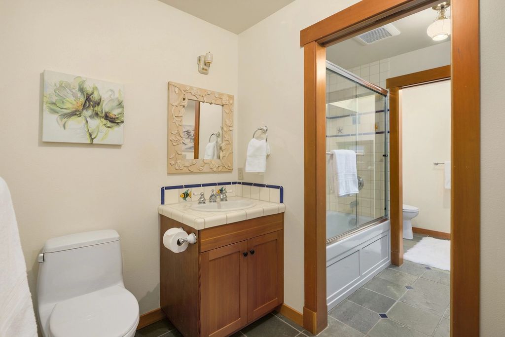The Home in Bainbridge Island is an exceptional custom estate with 2 homes on a combined acre including 139’ of spectacular water frontage, now available for sale. This home located at 17253 & 17204 Agate Street NE, Bainbridge Island, Washington