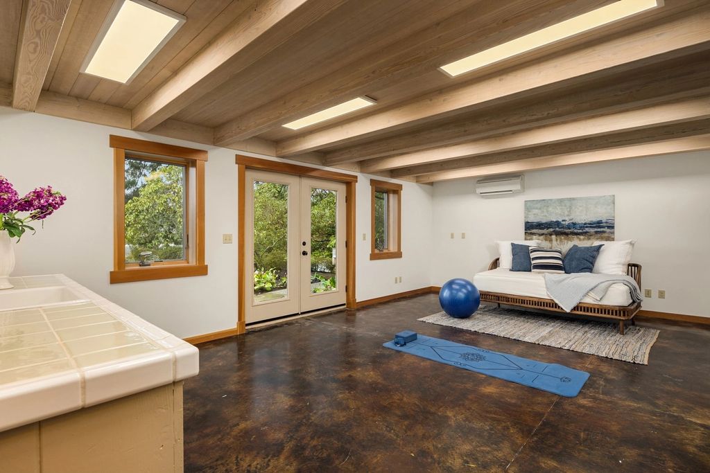 The Home in Bainbridge Island is an exceptional custom estate with 2 homes on a combined acre including 139’ of spectacular water frontage, now available for sale. This home located at 17253 & 17204 Agate Street NE, Bainbridge Island, Washington