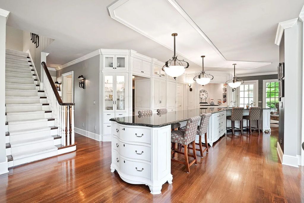 The Estate in Powell is a luxurious home providing grand living spaces with breathtaking woodland views and huge entertainment areas now available for sale. This home located at 1903 Strathshire Hall Ln, Powell, Ohio; offering 06 bedrooms and 08 bathrooms with 10,106 square feet of living spaces.