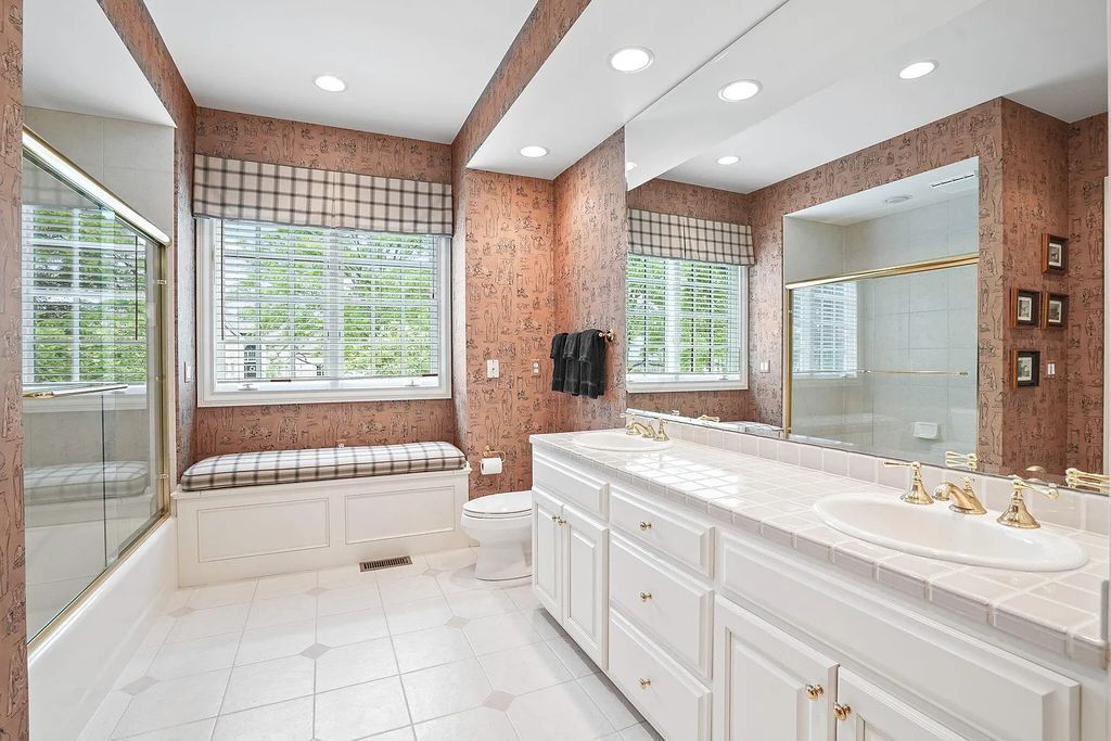 The Estate in Powell is a luxurious home providing grand living spaces with breathtaking woodland views and huge entertainment areas now available for sale. This home located at 1903 Strathshire Hall Ln, Powell, Ohio; offering 06 bedrooms and 08 bathrooms with 10,106 square feet of living spaces.