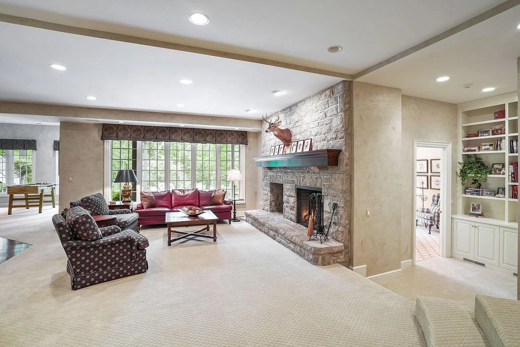 The Estate in Powell is a luxurious home providing grand living spaces with breathtaking woodland views and huge entertainment areas now available for sale. This home located at 1903 Strathshire Hall Ln, Powell, Ohio; offering 06 bedrooms and 08 bathrooms with 10,106 square feet of living spaces.