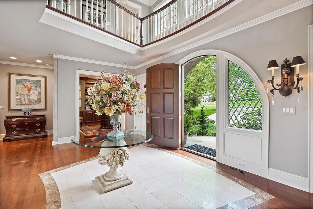 The Estate in Powell is a luxurious home providing grand living spaces with breathtaking woodland views and huge entertainment areas now available for sale. This home located at 1903 Strathshire Hall Ln, Powell, Ohio; offering 06 bedrooms and 08 bathrooms with 10,106 square feet of living spaces.