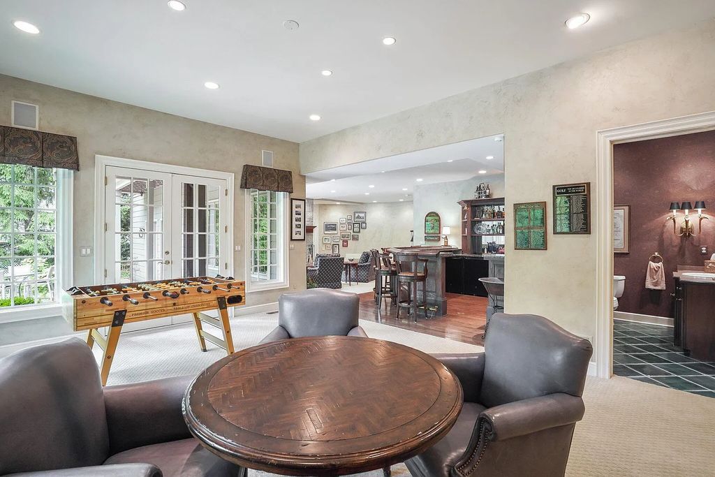 The Estate in Powell is a luxurious home providing grand living spaces with breathtaking woodland views and huge entertainment areas now available for sale. This home located at 1903 Strathshire Hall Ln, Powell, Ohio; offering 06 bedrooms and 08 bathrooms with 10,106 square feet of living spaces.