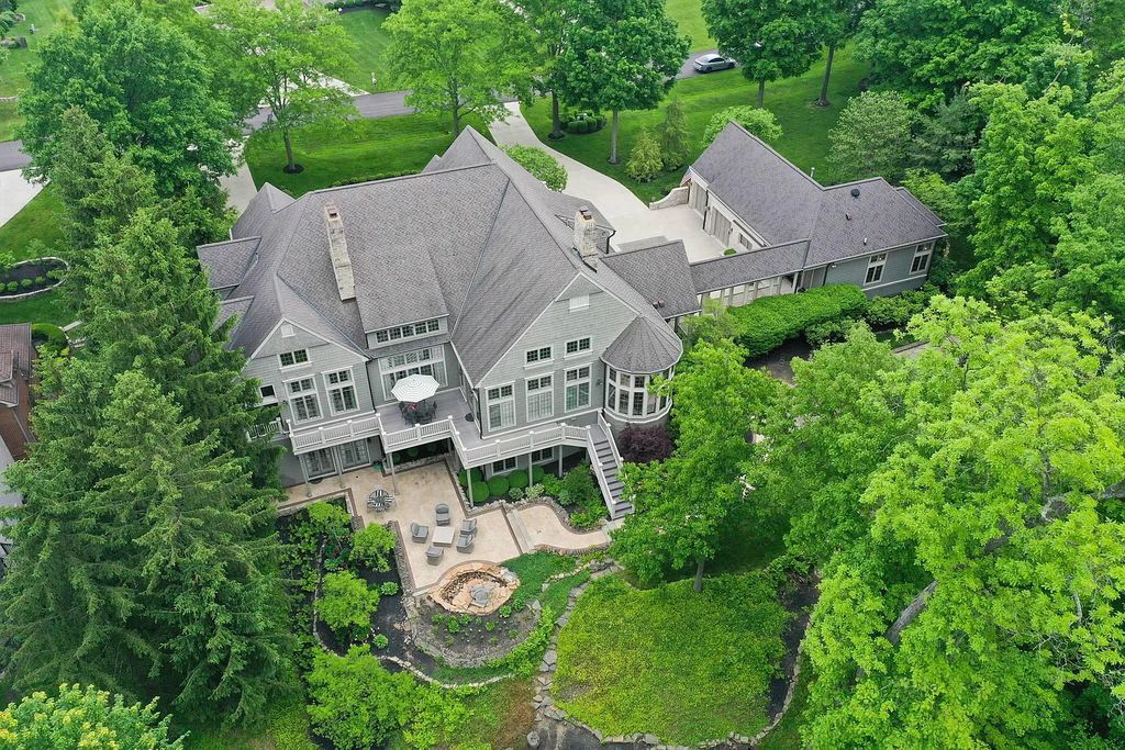 The Estate in Powell is a luxurious home providing grand living spaces with breathtaking woodland views and huge entertainment areas now available for sale. This home located at 1903 Strathshire Hall Ln, Powell, Ohio; offering 06 bedrooms and 08 bathrooms with 10,106 square feet of living spaces.