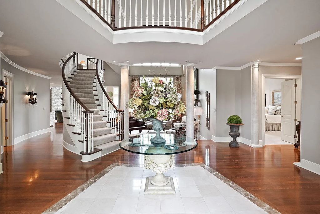 The Estate in Powell is a luxurious home providing grand living spaces with breathtaking woodland views and huge entertainment areas now available for sale. This home located at 1903 Strathshire Hall Ln, Powell, Ohio; offering 06 bedrooms and 08 bathrooms with 10,106 square feet of living spaces.
