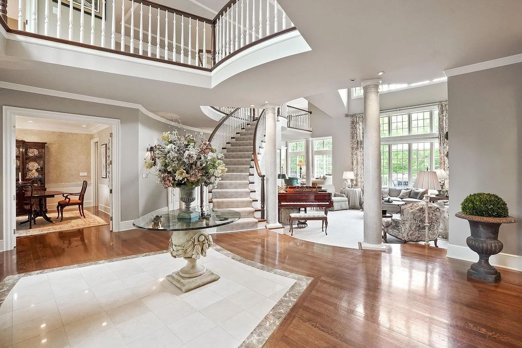 The Estate in Powell is a luxurious home providing grand living spaces with breathtaking woodland views and huge entertainment areas now available for sale. This home located at 1903 Strathshire Hall Ln, Powell, Ohio; offering 06 bedrooms and 08 bathrooms with 10,106 square feet of living spaces.