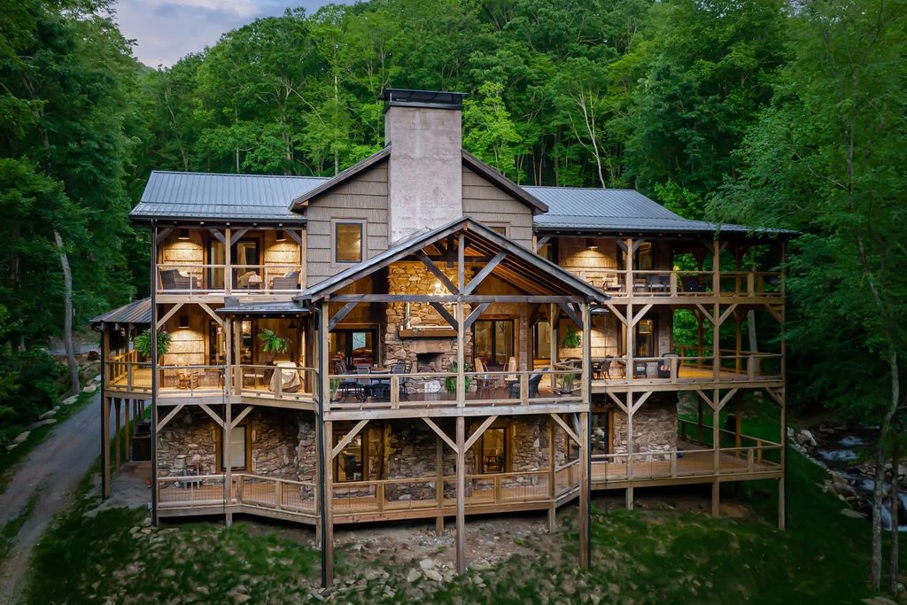The Estate in Canton incorporates elements from the land with sustainable materials, now available for sale. This home located at 16 Gihon Waters Trl, Canton, North Carolina