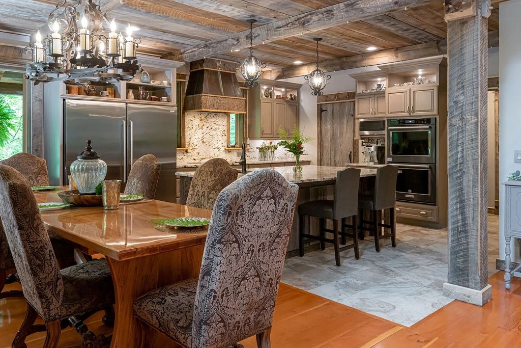 The Estate in Canton incorporates elements from the land with sustainable materials, now available for sale. This home located at 16 Gihon Waters Trl, Canton, North Carolina