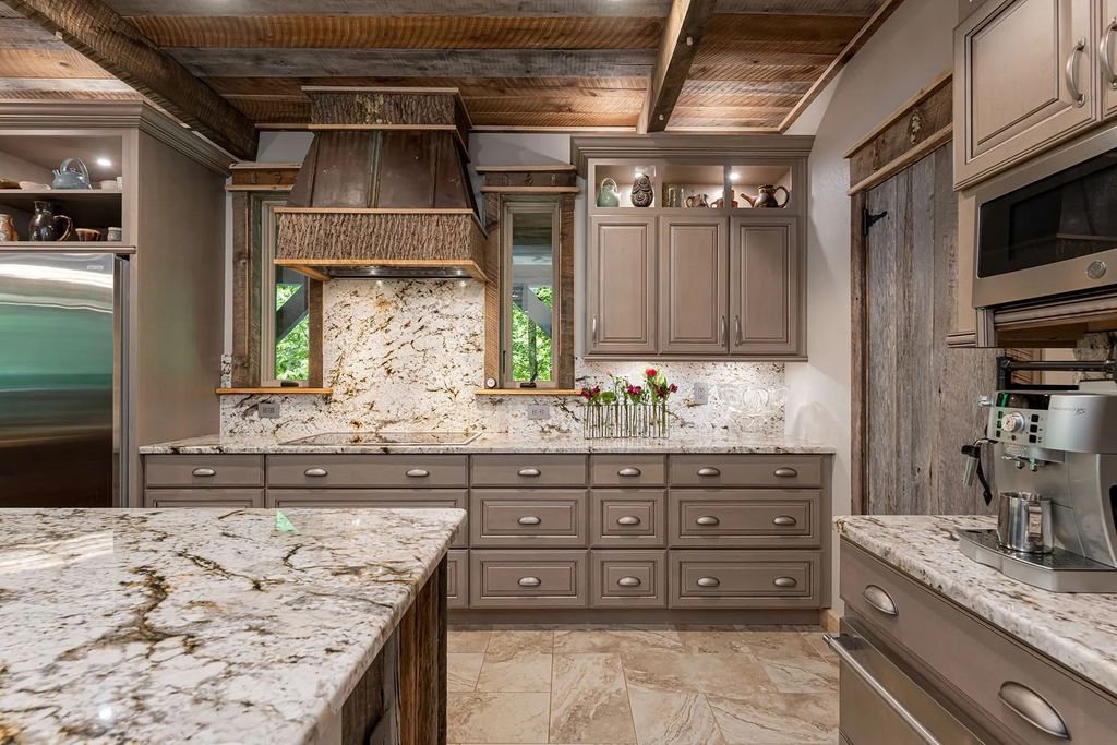 The Estate in Canton incorporates elements from the land with sustainable materials, now available for sale. This home located at 16 Gihon Waters Trl, Canton, North Carolina