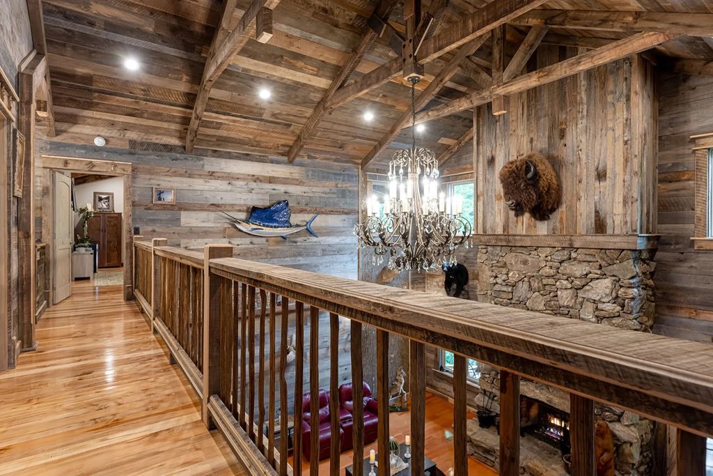 The Estate in Canton incorporates elements from the land with sustainable materials, now available for sale. This home located at 16 Gihon Waters Trl, Canton, North Carolina